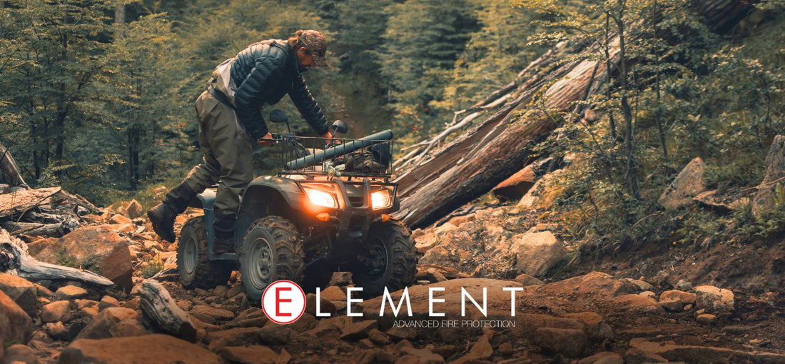 A person navigating their ATV through a rocky terrain.