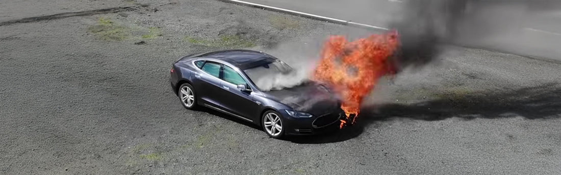 Tesla car on fire experiencing thermal runaway.
